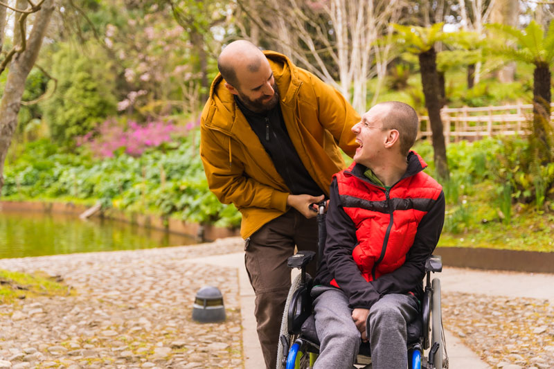 Resident and Volunteer enjoying time outdoors